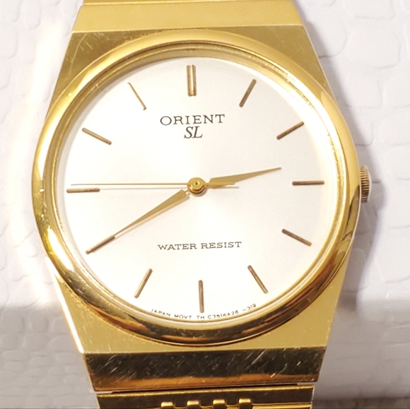Vintage Orient Mens Gold Tone Quartz Watch Silver Dial Stainless Steel One Jewel - Picture 1 of 11